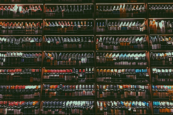 Many Wine Bottles on the Shelf