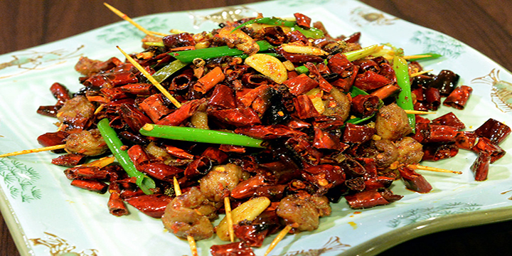 Spicy Sichaun lamb with garlic and chilli on a plate