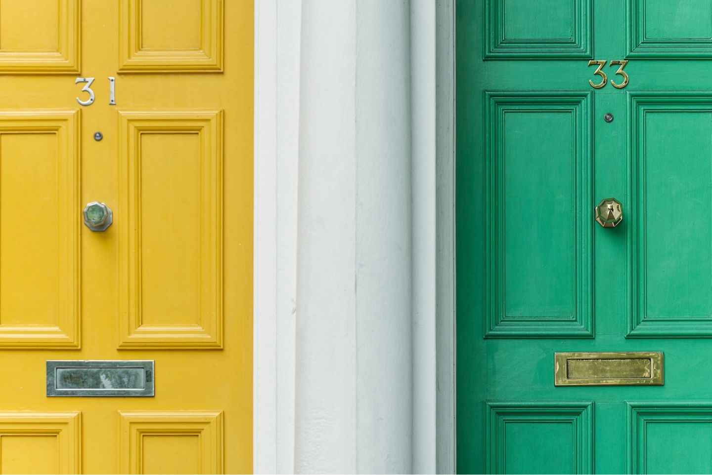 A yellow door and a green door