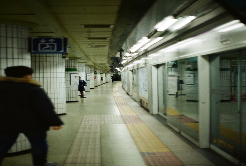 People Walking In A Subway Station