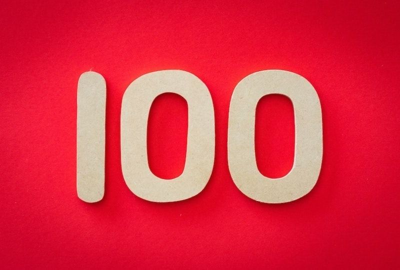 number 100 on a red background