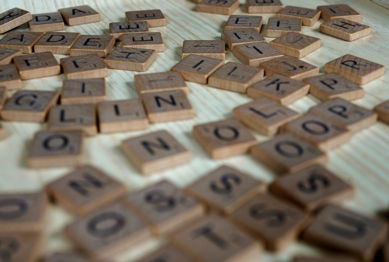 Scrabble game letters showing vocabulary being built