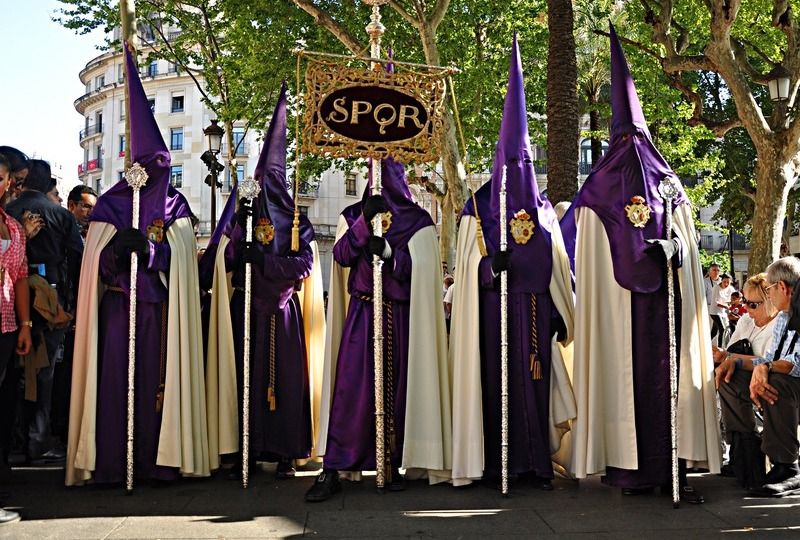 Religious men in purple hoods for Holy Week in Spain