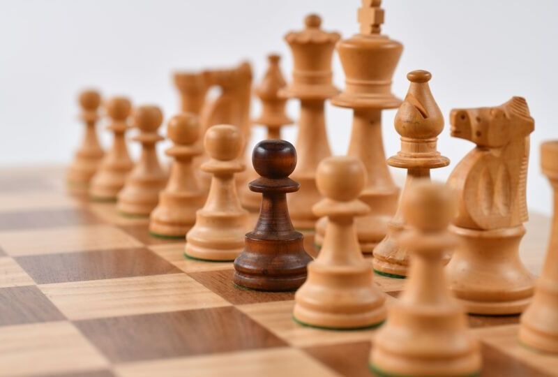 A close up shot of a chess board