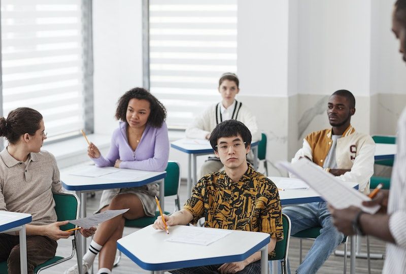 Group of young adults in a classroom