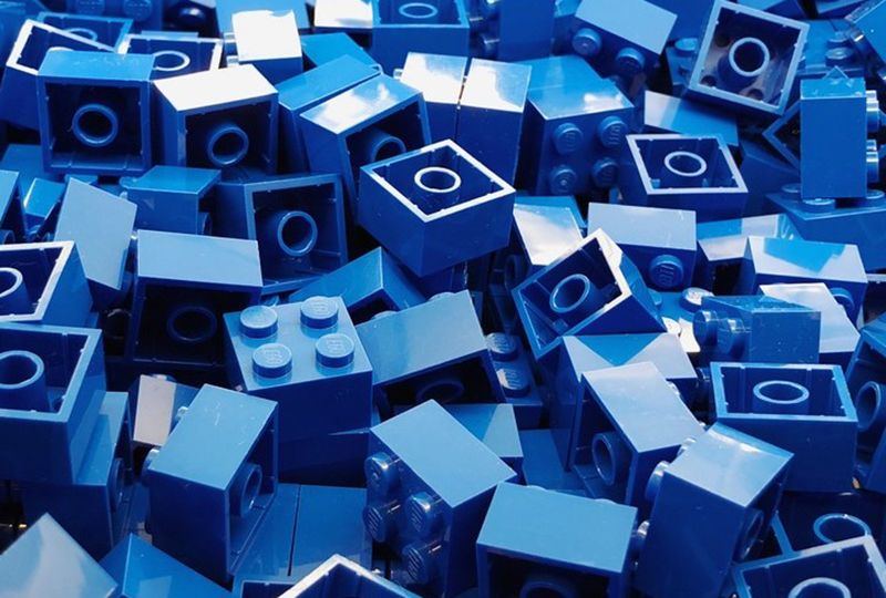 Blue lego pieces in a pile