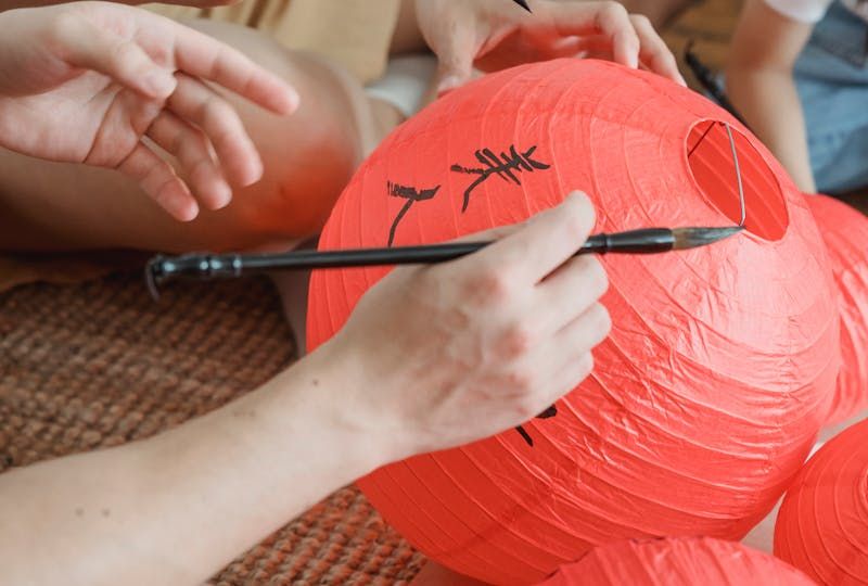 Writing of japanese calligraphy in a red lantern