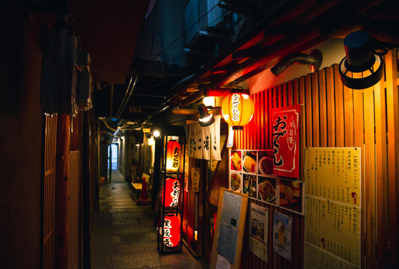 japanese cafes on empty narrow street in evening