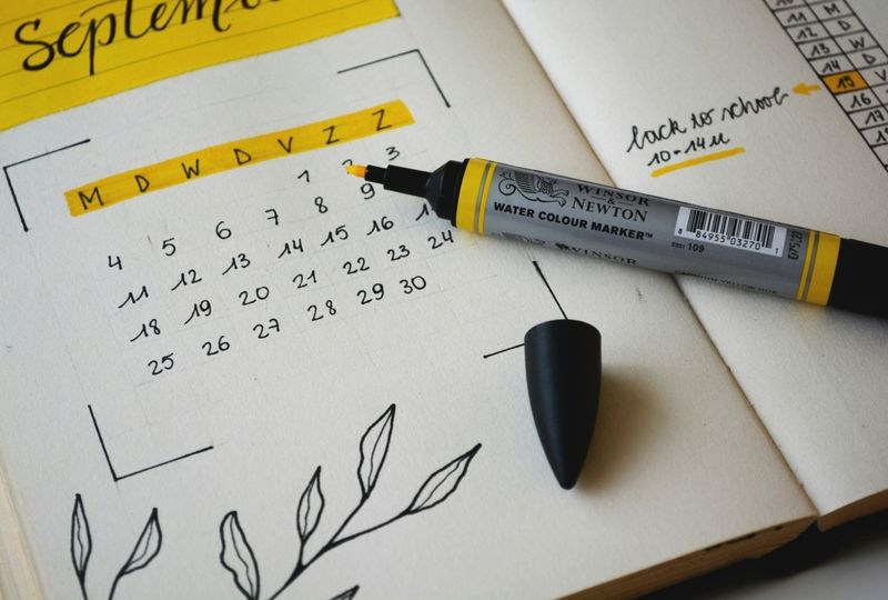 Calendar of September marked with a yellow marker