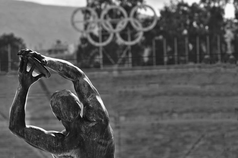 Olympic rings and statue.