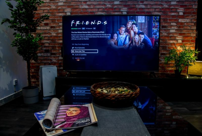 TV in a dark room showing TV series