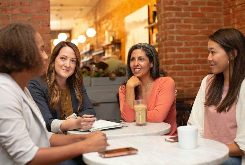 A group of professional women having coffee