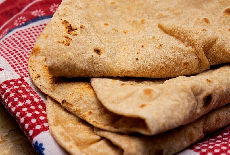 Fresh tortillas wrapped in a cloth