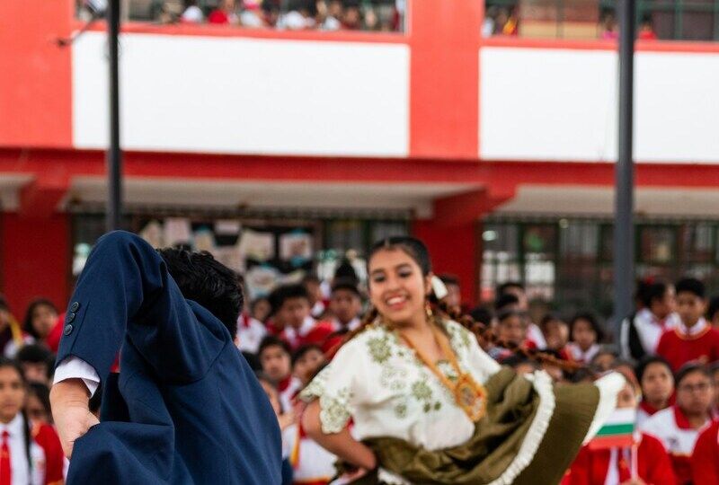 Hispanic people performing a traditional dance