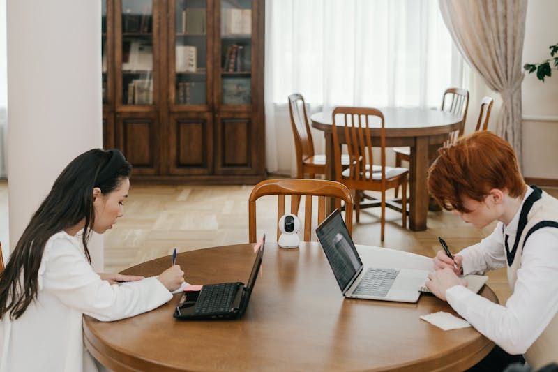 Two people studying French together.